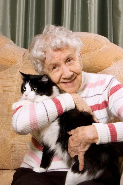 files/depositphotos_5222866-stock-photo-the-grandmother-with-a-cat.webp